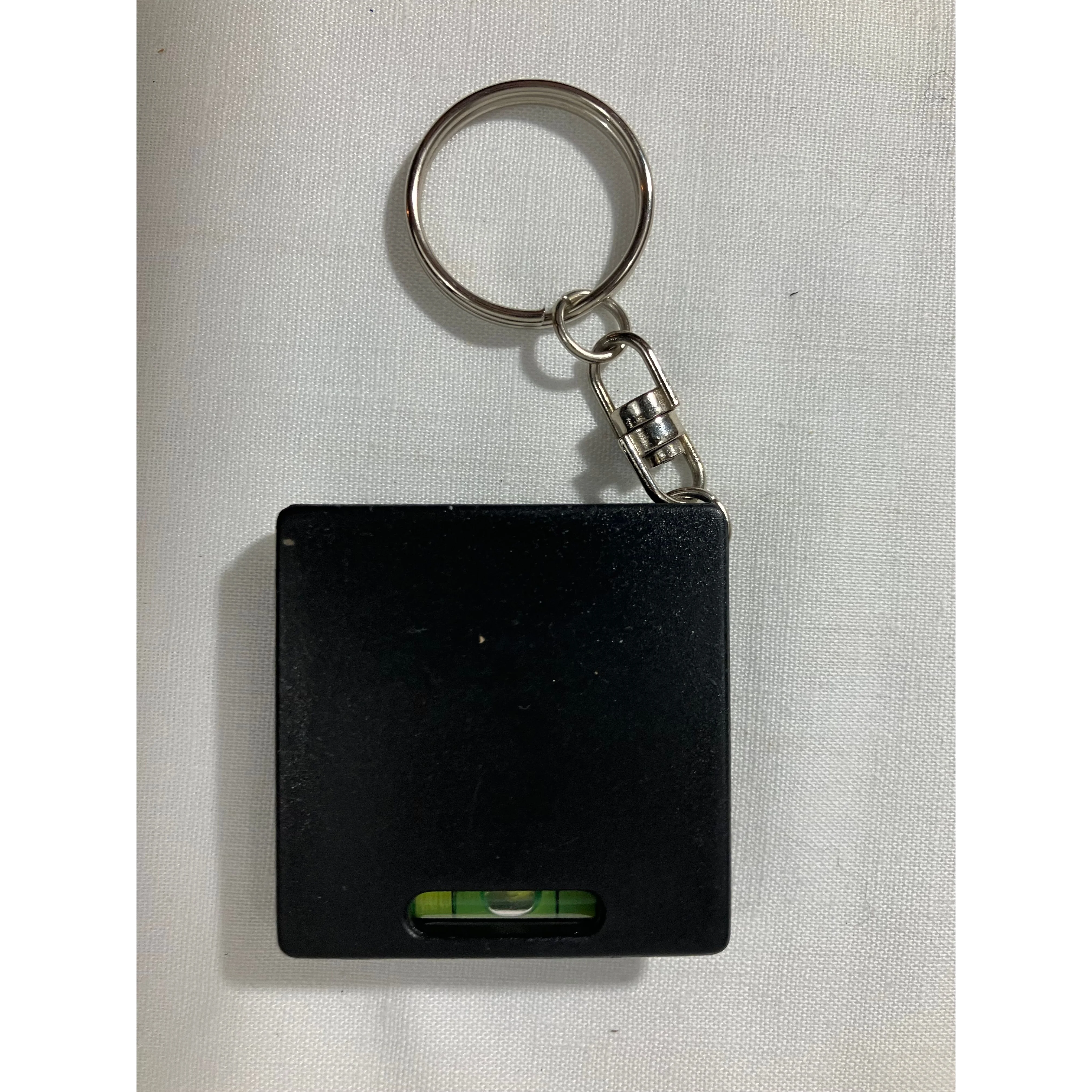 Weaver Model Trains keychain with tape measure and level — photo 2