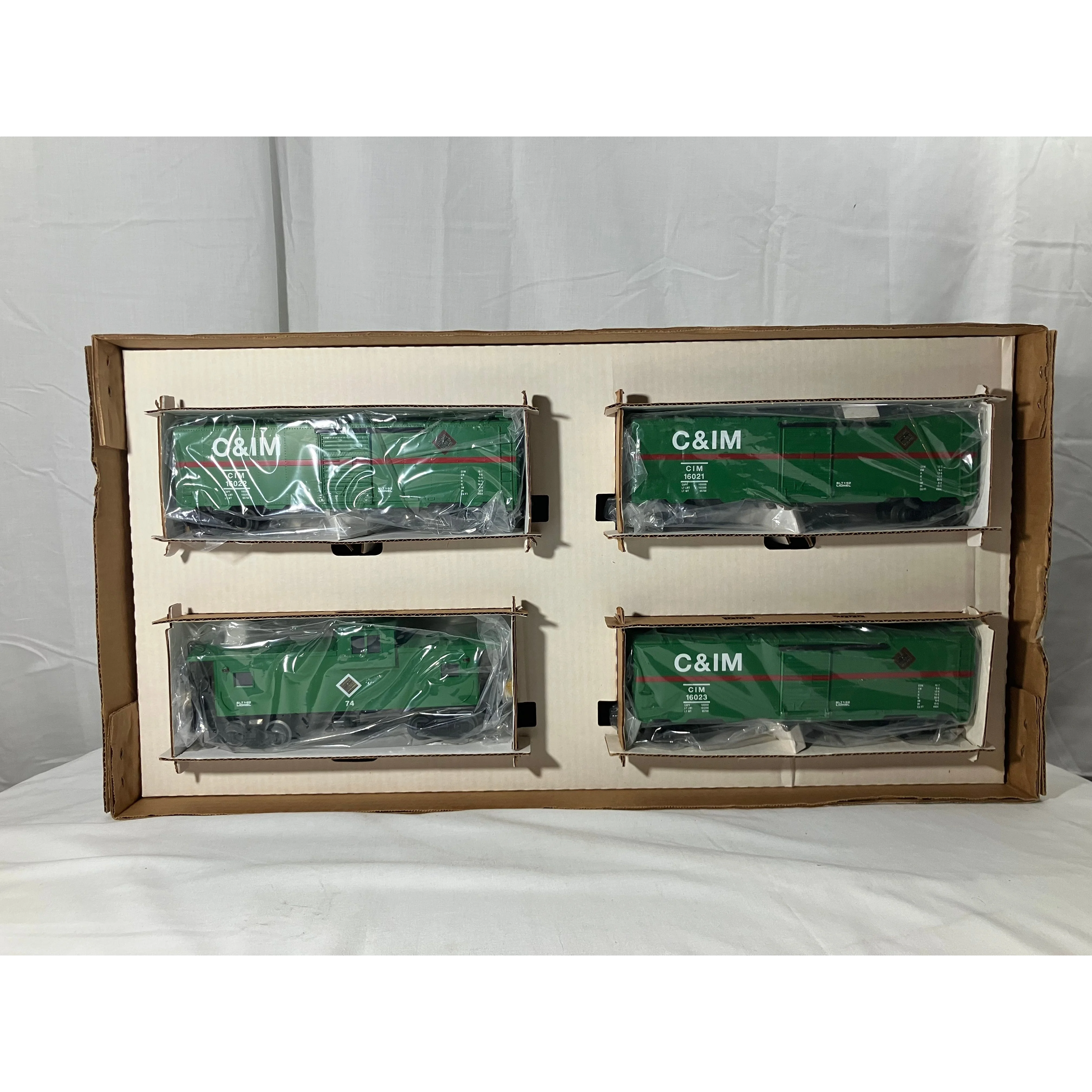 Lionel 6-18556 O scale 3 rail set of 3 boxcars/1 caboose C & IM