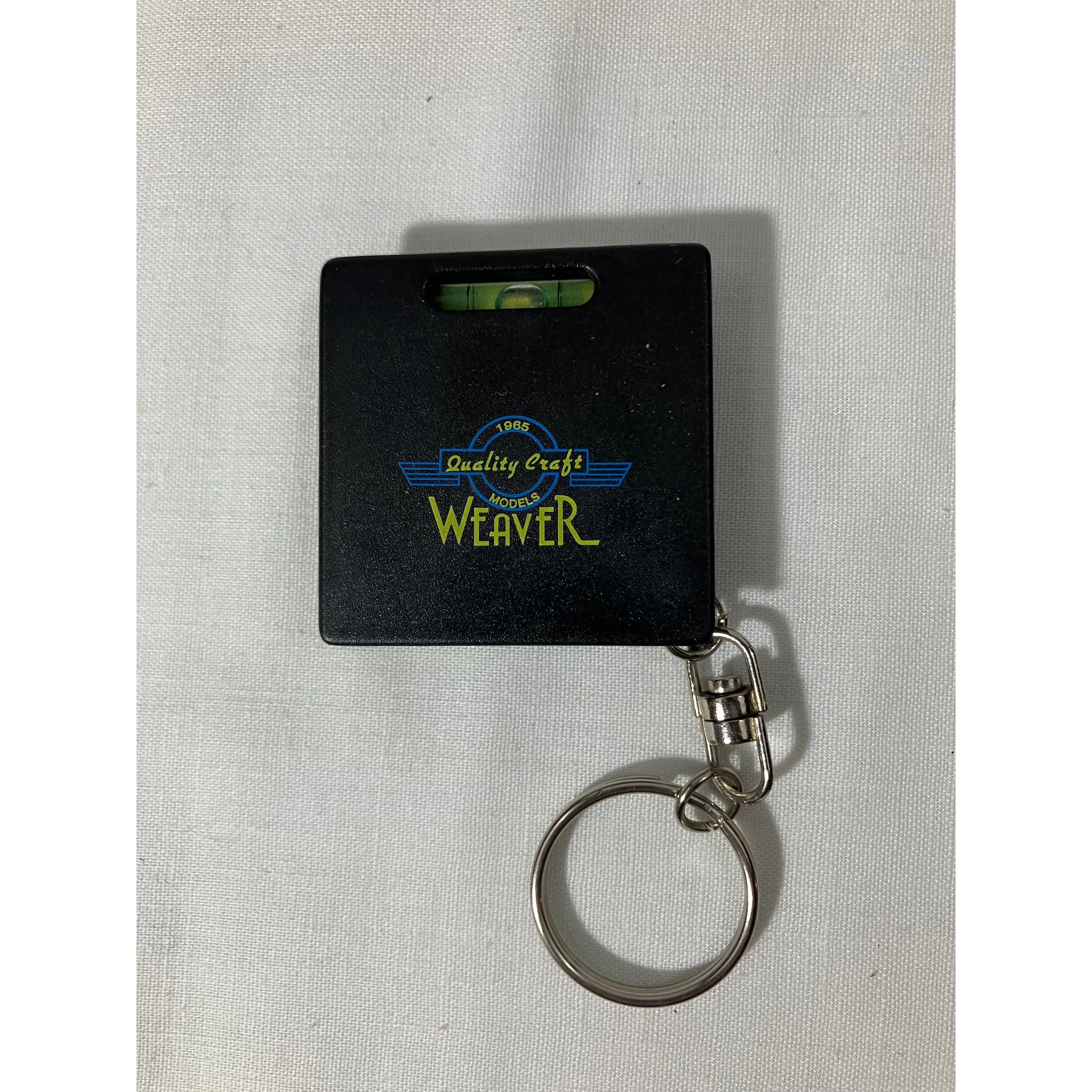 Weaver Model Trains keychain with tape measure and level